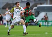 22 July 2010; Alonso Ferrira de Matos, CS Marítimo, in action against Conan Byrne, Sporting Fingal. UEFA Europa League Second Qualifying Round, 2nd Leg, Sporting Fingal v CS Marítimo, Dalymount Park, Dublin. Picture credit: Matt Browne / SPORTSFILE