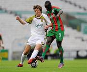 22 July 2010; Shane Mvfaul, Sporting Fingal, intercepts  Papa Babacar Diawara, CS Marítimo. UEFA Europa League Second Qualifying Round, 2nd Leg, Sporting Fingal v CS Marítimo, Dalymount Park, Dublin. Picture credit: Barry Cregg / SPORTSFILE