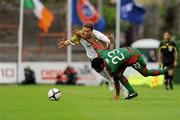 22 July 2010; Valdecir Souza Junior, CS Marítimo, tries to stop Ger O'Brien, Sporting Fingal, from getting to the ball. UEFA Europa League Second Qualifying Round, 2nd Leg, Sporting Fingal v CS Marítimo, Dalymount Park, Dublin. Picture credit: Barry Cregg / SPORTSFILE