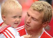 18 July 2010; Tyrone's Owen Mulligan with his nephew Charlie, age 2 1/2, after the game. Ulster GAA Football Senior Championship Final, Monaghan v Tyrone, St Tighearnach's Park, Clones, Co. Monaghan. Picture credit: Brendan Moran / SPORTSFILE