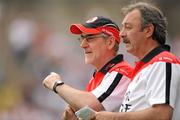 18 July 2010; Mickey Harte, Tyrone manager, with selector Tony Donnelly. Ulster GAA Football Senior Championship Final, Monaghan v Tyrone, St Tighearnach's Park, Clones, Co. Monaghan. Picture credit: Brendan Moran / SPORTSFILE