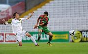 22 July 2010; Danilo Leandro Dias, CS Marítimo, in action against Shane McFaul, Sporting Fingal. UEFA Europa League Second Qualifying Round, 2nd Leg, Sporting Fingal v CS Marítimo, Dalymount Park, Dublin. Picture credit: Barry Cregg / SPORTSFILE