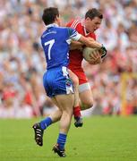 18 July 2010; Conor Gormley, Tyrone, in action against Gary McQuaid, Monaghan. Ulster GAA Football Senior Championship Final, Monaghan v Tyrone, St Tighearnach's Park, Clones, Co. Monaghan. Picture credit: Oliver McVeigh / SPORTSFILE