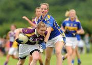 24 July 2010; Brid Doyle, Wexford, in action against Katie Crowe, Tipperary. Ladies Gaelic Football Minor B All-Ireland Final, Wexford v Tipperary, Freshford GAA Grounds, Freshford, Co. Kilkenny. Picture credit: Ray Lohan / SPORTSFILE