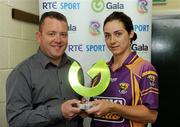 24 July 2010; Aoife O'Connor, Wexford, is presented with the player of the match trophy by Michael O'Shaughnessy, Gala National Development Manager. Gala All-Ireland Senior Camogie Championship, Wexford v Kilkenny, Wexford Park, Wexford. Picture credit: Matt Browne / SPORTSFILE