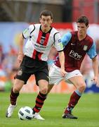 24 July 2010; Aaron Greene, Bohemians, in action against Ciaran Clarke, Aston Villa. Pre-Season Friendly, Bohemians v Aston Villa, Dalymount Park, Dublin. Picture credit: Brendan Moran / SPORTSFILE