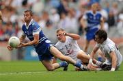 24 July 2010; Tomas Freeman, Monaghan, in action against Peter Kelly and Aindriu MacLochlainn, Kildare. GAA Football All-Ireland Senior Championship Qualifier, Round 4, Monaghan v Kildare, Croke Park, Dublin. Picture credit: Oliver McVeigh / SPORTSFILE
