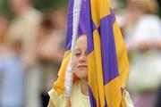 24 July 2010; Wexford fan Niamh Tormey, 9, watches the final minutes of the game. Ladies Gaelic Football Minor B All-Ireland Final, Wexford v Tipperary, Freshford GAA Grounds, Freshford, Co. Kilkenny. Picture credit: Ray Lohan / SPORTSFILE