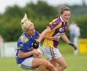 24 July 2010; Shauna Maher, Tipperary, in action against Clara Donnelly, Wexford. Ladies Gaelic Football Minor B All-Ireland Final, Wexford v Tipperary, Freshford GAA Grounds, Freshford, Co. Kilkenny. Picture credit: Ray Lohan / SPORTSFILE