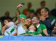 18 June 2016; Claudine Keane, wife of Republic of Ireland's Robbie Keane, poses for a picture with her mother Joan, son Robert and brother Ronan during the UEFA Euro 2016 Group E match between Belgium and Republic of Ireland at Nouveau Stade de Bordeaux in Bordeaux, France. Photo by Stephen McCarthy/Sportsfile