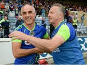 18 June 2016; Laois manager Mick Lillis, right, and selector Anthony Cunningham celebrate after the GAA Football All-Ireland Senior Championship Qualifier Round 1A match between Laois and Armagh at O'Moore Park in Portlaoise, Co. Laois. Photo by Matt Browne/Sportsfile