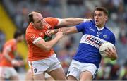 18 June 2016; Colm Begley of Laois in action against Ciaran McKeever of Armagh during the GAA Football All-Ireland Senior Championship Qualifier Round 1A match between Laois and Armagh at O'Moore Park in Portlaoise, Co. Laois. Photo by Matt Browne/Sportsfile
