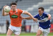 18 June 2016; Joe McElroy of Armagh in action against Niall Donoher of Laois during the GAA Football All-Ireland Senior Championship Qualifier Round 1A match between Laois and Armagh at O'Moore Park in Portlaoise, Co. Laois. Photo by Matt Browne/Sportsfile