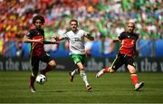 18 June 2016; Axel Witsel of Belgium in action against Robbie Brady of Republic of Ireland during the UEFA Euro 2016 Group E match between Belgium and Republic of Ireland at Nouveau Stade de Bordeaux in Bordeaux, France. Photo by Stephen McCarthy/Sportsfile