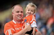 18 June 2016; Armagh supporters Darragh Brennan and his two year old daughter Hannah from Granemore, Co. Armagh at the GAA Football All-Ireland Senior Championship Qualifier Round 1A match between Laois and Armagh at O'Moore Park in Portlaoise, Co. Laois. Photo by Matt Browne/Sportsfile
