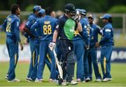 16 June 2016; William Porterfield of Ireland leaves the field after being caught by Anjelo Mathews of Sri Lanka of a delivery by Suranga Lakmal during the One Day International match between Ireland and Sri Lanka at Malahide Cricket Ground in Malahide, Dublin. Photo by Seb Daly/Sportsfile