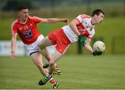 18 June 2016; Niall Loughlin of Derry in action against Adrian Reid of Louth during the GAA Football All-Ireland Senior Championship Qualifier Round 1A match between Derry and Louth at Owenbeg Centre of Excellence in Dungiven, Derry. Photo by Oliver McVeigh/Sportsfile