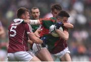 18 June 2016; Evan Regan of Mayo is tackled by Liam Silke, left, and Eoghan Kerin of Galway during the Connacht GAA Football Senior Championship Semi-Final match between Mayo and Galway at Elverys MacHale Park in Castlebar, Co Mayo. Photo by Ramsey Cardy/Sportsfile