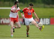 18 June 2016; Adrian Reid of Louth in action against Niall Loughlin of Derry during the GAA Football All-Ireland Senior Championship Qualifier Round 1A match between Derry and Louth at Owenbeg Centre of Excellence in Dungiven, Derry. Photo by Oliver McVeigh/Sportsfile