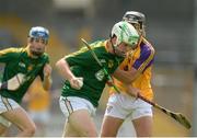 18 June 2016; Darragh Goulding of Kerry in action against Kyle Firman of South Wexford during the Corn John Scott, Division 2, Celtic Challenge Final 2016 match between Kerry and South Wexford at Nowlan Park in Kilkenny. Photo by Piaras Ó Mídheach/Sportsfile