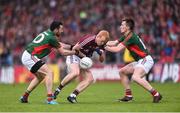 18 June 2016; Declan Kyne of Galway is tackled by Kevin McLoughlin, left, and Cillian O’Connor of Mayo during the Connacht GAA Football Senior Championship Semi-Final match between Mayo and Galway at Elverys MacHale Park in Castlebar, Co Mayo. Photo by Ramsey Cardy/Sportsfile