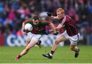 18 June 2016; Keith Higgins of Mayo is tackled by Declan Kyne of Galway during the Connacht GAA Football Senior Championship Semi-Final match between Mayo and Galway at Elverys MacHale Park in Castlebar, Co Mayo. Photo by Ramsey Cardy/Sportsfile