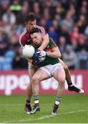18 June 2016; Evan Regan of Mayo is tackled by Eoghan Kerin of Galway during the Connacht GAA Football Senior Championship Semi-Final match between Mayo and Galway at Elverys MacHale Park in Castlebar, Co Mayo. Photo by Ramsey Cardy/Sportsfile