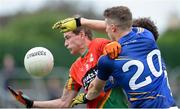 18 June 2016; Seán Gannon of Carlow in action against Danny Woods (20) and Sam Thompson of Wicklow in the GAA Football All-Ireland Senior Championship Qualifier Round 1A match between Carlow and Wicklow at Netwatch Cullen Park in Carlow. Photo by Ray Lohan/Sportsfile