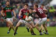 18 June 2016; Evan Regan of Mayo in action against Eoghan Kerin, left, and Gary Sice of Galway during the Connacht GAA Football Senior Championship Semi-Final match between Mayo and Galway at Elverys MacHale Park in Castlebar, Co Mayo. Photo by Daire Brennan/Sportsfile
