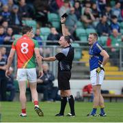 18 June 2016; Referee Pádraig O'Sullivan issues a black card to Brendan Murphy of Carlow as Dean Healy of Wicklow looks on in the GAA Football All-Ireland Senior Championship Qualifier Round 1A match between Carlow and Wicklow at Netwatch Cullen Park in Carlow. Photo by Ray Lohan/Sportsfile