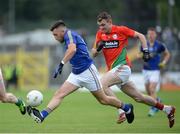 18 June 2016; Darren Hayden of Wicklow in action against Gary Kelly of Carlow in the GAA Football All-Ireland Senior Championship Qualifier Round 1A match between Carlow and Wicklow at Netwatch Cullen Park in Carlow. Photo by Ray Lohan/Sportsfile