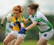 24 July 2010; Katie Tyrrell, Leitrim, in action against Ciara McHugh, Fermanagh. Ladies Gaelic Football Minor B Shield All-Ireland Final, Leitrim v Fermanagh, Templeport GAA Grounds, Bawnboy, Co. Cavan. Picture credit: Ray McManus / SPORTSFILE