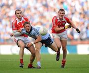 24 July 2010; Paul Flynn, Dublin, in action against Paddy Keenan and Dessie Finnegan, Louth. GAA Football All-Ireland Senior Championship Qualifier, Round 4, Dublin v Louth, Croke Park, Dublin. Picture credit: Oliver McVeigh / SPORTSFILE