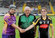 24 July 2010; Referee Eamon Browne with team captains Una Leacy, Wexford, and Ann Dalton, Kilkenny. Gala All-Ireland Senior Camogie Championship, Wexford v Kilkenny, Wexford Park, Wexford. Picture credit: Matt Browne / SPORTSFILE