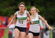 25 July 2010; Marie Heelan, Emerald AC, receives the baton from team-mate Lynn O' Mara, during the Girl's U-16 4 x 100m race, at the Woodie's DIY Juvenile Track and Field Championships. Tullamore Harriers Stadium, Tullamore, Co. Offaly. Picture credit: Barry Cregg / SPORTSFILE