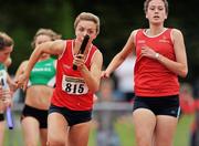 25 July 2010; Lilly-Ann O' Hora, Dooneen AC, receives the baton from team-mate Niamh O' Conor, during the Girl's U-18 4 x 100m race, at the Woodie's DIY Juvenile Track and Field Championships. Tullamore Harriers Stadium, Tullamore, Co. Offaly. Picture credit: Barry Cregg / SPORTSFILE