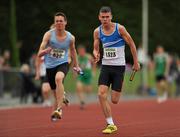 25 July 2010; Simon Doyle, St. Laurence O' Toole, on his way to win the U-19 Boy's 4 x 100m race, ahead of Ben Dennison, St. Brendan's, during the Woodie's DIY Juvenile Track and Field Championships. Tullamore Harriers Stadium, Tullamore, Co. Offaly. Picture credit: Barry Cregg / SPORTSFILE