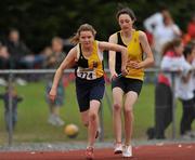 25 July 2010; Margret Caldbeck, Kilkenny City Harriers, receives the baton from team-mate Niamh Leehey, during the Woodie's DIY Juvenile Track and Field Championships. Tullamore Harriers Stadium, Tullamore, Co. Offaly. Picture credit: Barry Cregg / SPORTSFILE