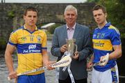 26 July 2010; Tipperary captain Padraic Maher, right, and John Conlon, left, Clare captain, with Ger Cunningham, Sports Sponsorship manager Bord Gáis Energy, met halfway on the bridge at Killaloe, Co. Clare and Ballina, Co. Tipperary ahead of Wednesday night’s Bord Gáis Energy Munster GAA Hurling U-21 Final. Tipperary will look to upset current Munster and All-Ireland champions Clare on home turf at Semple Stadium, where throw in is at 7.30pm. Killaloe, Co. Clare. Picture credit: David Maher / SPORTSFILE
