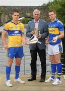 26 July 2010; Tipperary captain Padraic Maher, right, and John Conlon, left, Clare captain with Ger Cunningham, Sports Sponsorship manager Bord Gáis Energy, met halfway on the bridge at Killaloe, Co. Clare and Ballina, Co. Tipperary ahead of Wednesday night’s Bord Gáis Energy Munster GAA Hurling U-21 Final. Tipperary will look to upset current Munster and All-Ireland champions Clare on home turf at Semple Stadium, where throw in is at 7.30pm. Killaloe, Co. Clare. Picture credit: David Maher / SPORTSFILE