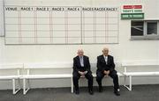 26 July 2010; Brothers Paddy, left, and Jimmy Hennessy, from Dundrum, Co. Tipperary, relax before the evening's racing. Galway Racing Festival 2010, Ballybrit, Galway. Picture credit: Ray McManus / SPORTSFILE