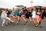 26 July 2010; Racegoers, from left, Ciara Burke, from Cork, Hazel O'Leary, from Kerry, Marione McHugh, from Sligo, Helen McGorrin, from Sligo, Sarah Ross, from Cork, Lynn Gaffney, from Cavan, Marie Morris, from Kerry, Lisa Ryan, from Cavan, Una O'Leary, from Cork, Roisin Johnson, from Kerry, Ailbhe Forde, from Mayo, and Ciara O'Leary, from Kerry, enjoy the party atmosphere during the first evening of the Galway Racing Festival. Galway Racing Festival 2010, Ballybrit, Galway. Picture credit: Ray McManus / SPORTSFILE