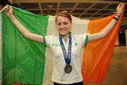 27 July 2010; Ireland's Ciara Mageean on her arrival home with the Ireland Junior athletics team after winning a silver medal at the13th IAAF World Junior Championships in New Brunswick, Canada. Dublin Airport, Dublin. Picture credit: David Maher / SPORTSFILE