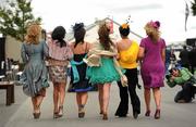 27 July 2010; Ms Sinéad Purcell and her sister Jackie, from Taylors Hill, Galway, are photographed by photographer Ray Ryan, with four sisters, from Scarriff, Co. Clare, Liz, Joanne, Sarah and Mary Skelly at the races. Galway Racing Festival 2010, Ballybrit, Galway. Picture credit: Ray McManus / SPORTSFILE