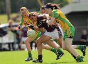 24 July 2010; Dora Gorman, Galway, in action against, from left, Orlaith Furlong, Emer Gallagher, and Tanya Kennedy, Donegal. Ladies Gaelic Football Minor A Championship All-Ireland Final, Donegal v Galway, Seán O'Heslin GAA Cub, Ballinamore, Co. Leitrim. Picture credit: Brian Lawless / SPORTSFILE