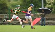 19 June 2016; Paul Deeney, Faythe Harriers, Wexford, in action against Luke Hogan, Glen Rovers, Cork, during the John West Féile na nGael Diovision One Final Glen Rovers, Cork, v Faythe Harriers, Wexford, at Leahy Park in Waller's-Lot, Co Tipperary. Photo by Matt Browne/Sportsfile