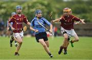 19 June 2016; Liam Fahy of Oranmore-Maree, Galway, in action against Josh Maher, right, and Liam Keating of St. Oliver Plunkett Eoghan Ruadh, Dublin, during the John West Féile na nGael Division Three Final at Leahy Park in Waller's-Lot, Co Tipperary. Photo by Matt Browne/Sportsfile