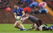 19 June 2016; David Givney of Cavan gets away from Michael O’Neill of Tyrone on his way to scoring his side's first goal of the game during the Ulster GAA Football Senior Championship Semi-Final match between Tyrone and Cavan at St Tiernach's Park in Clones, Co Monaghan. Photo by Ramsey Cardy/Sportsfile