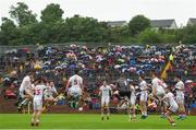 19 June 2016; The Tyrone team warm-up ahead of the Ulster GAA Football Senior Championship Semi-Final match between Tyrone and Cavan at St Tiernach's Park in Clones, Co Monaghan. Photo by Ramsey Cardy/Sportsfile