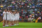 19 June 2016; The Tyrone team during the National Anthem ahead of the Ulster GAA Football Senior Championship Semi-Final match between Tyrone and Cavan at St Tiernach's Park in Clones, Co Monaghan. Photo by Ramsey Cardy/Sportsfile